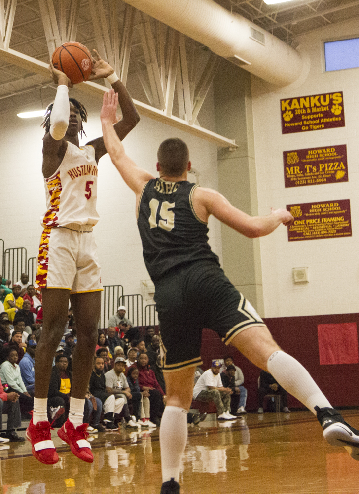 Staff photo by Troy Stolt / Howard's Kerrick Thorne (5) takes a shot during the boys' Class AA basketball sectional championship game between Upperman and Howard on Monday, March 9, 2020 in Chattanooga, Tenn. Upperman would win the game and advance to the state tournament.