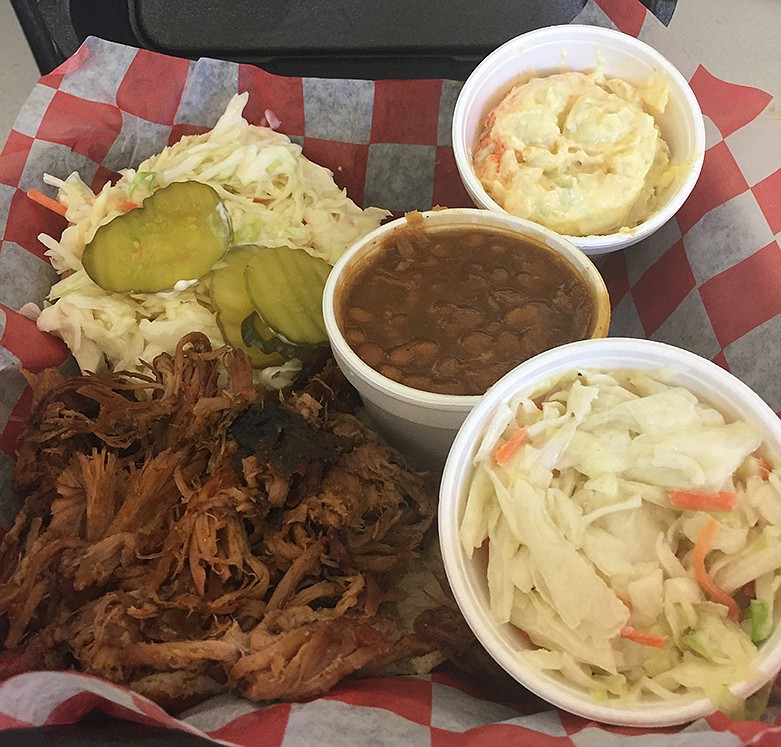 The pulled-pork sandwich at Charlie's Quick Stop on Main Street featured sides of potato salad, coleslaw and baked beans with the sandwich. / Photo by Susan Pierce