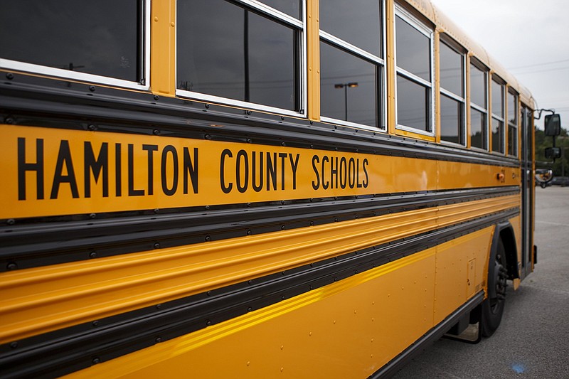 Staff photo by C.B. Schmelter / "Hamilton County Schools" is seen on a new school bus at the Hamilton County Department of Education on Wednesday, July 3, 2019 in Chattanooga, Tenn. First Student Inc. is providing the county with 185 new state-of-the-art buses which include GPS tracking systems, digital cameras, air conditioning and other features.