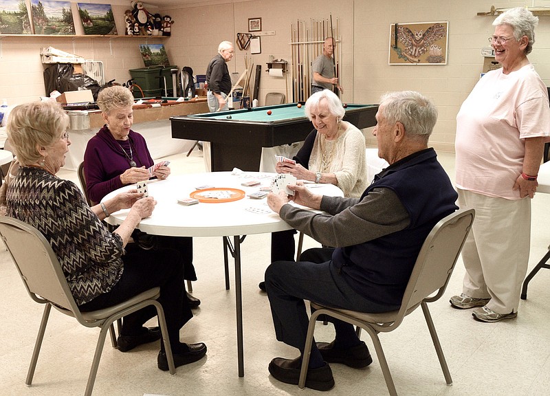 Staff Photo by Robin Rudd / Seniors play cards and billiards at the the Soddy-Daisy Senior Activity Center on March 13, 2020.  Many places that cater to seniors such as restaurants, senior centers and malls are closing because of the coronavirus.  Many places that cater to seniors such as restaurants, senior centers and malls are closing because of the coronavirus.  