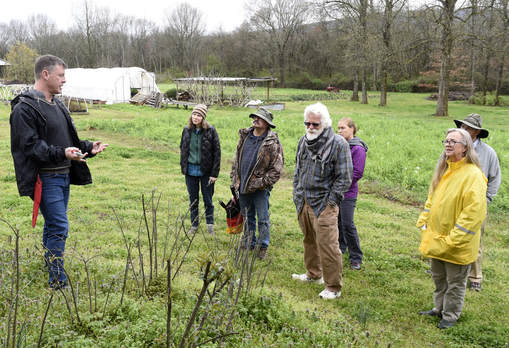 Staff Photo by Robin Rudd / Landscape architect Matt Whitaker explains the placement of plants during the workshop.  Whitaker led a "Pruning Intensive Workshop" at Crabtree Farms on March 14, 2020.