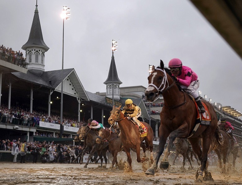 AP photo by Matt Slocum / Luis Saez rides Maximum Security, right, across the finish line first, ahead of Flavien Prat on Country House during the 145th running of the Kentucky Derby on May 4, 2019, at Churchill Downs in Louisville. This year's race, typically the first in the Triple Crown of Thoroughbred Racing, has been postponed from its traditional first Saturday in May date until Sept. 5, the first Saturday of that month.