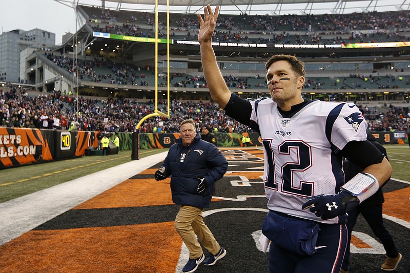 FILE - In this Dec. 15, 2019, file photo, New England Patriots quarterback Tom Brady (12) waves to the crowd after an NFL football game against the Cincinnati Bengals in Cincinnati. Tom Brady is an NFL free agent for the first time in his career. The 42-year-old quarterback with six Super Bowl rings said Tuesday morning, March 17, 2020, that he is leaving the New England Patriots. (AP Photo/Frank Victores, File)