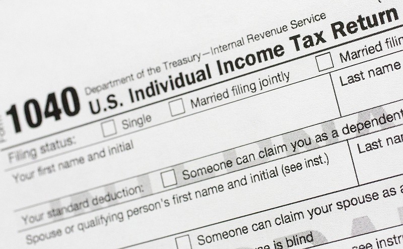 FILE - This July 24, 2018, file photo shows a portion of the 1040 U.S. Individual Income Tax Return form. (AP Photo/Mark Lennihan, File)


