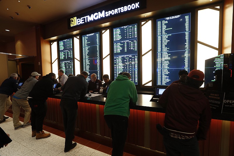 AP photo by Paul Sancya / Gamblers place bets at the MGM Grand Detroit casino on March 11, the day that legalized sports betting launched in Michigan. The COVID-19 epidemic has interrupted sports across the globe, and the gambling industry has had to turn to less likely wagering opportunities to fill the gap.