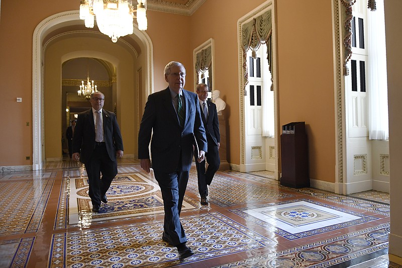 Senate Majority Leader Mitch McConnell of Ky., walks to the Senate floor on Capitol Hill in Washington, Thursday, March 19, 2020. (AP Photo/Susan Walsh)


