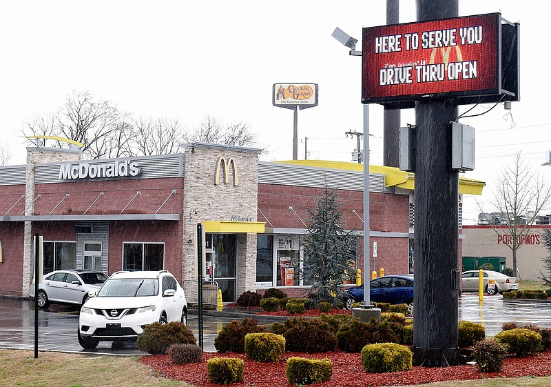 Staff Photo by Robin Rudd / The dining room at McDonalds's on Ringgold Road is closed, but the drive through remains open.  Dine in restaurants  have gone exclusively to take out and drive through because of the Coronavirus.  These locations were photographed on March 20, 2020.   