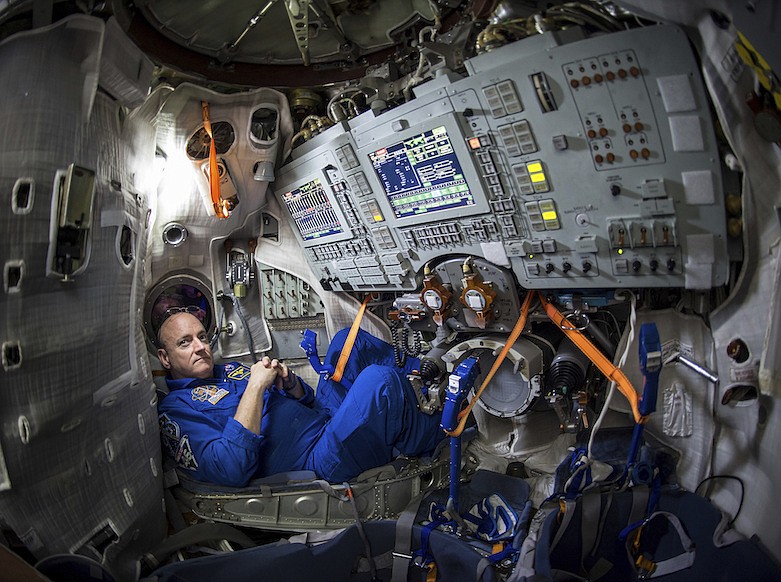 In this Wednesday, March 4, 2015 photo provided by NASA, astronaut Scott Kelly sits inside a Soyuz simulator at the Gagarin Cosmonaut Training Center (GCTC) in Star City, Russia. Astronaut wannabe Rachel Zimmerman-Brachman, a public engagement specialist at NASA's Jet Propulsion Laboratory, says that isolation is a lot like astronaut training. On Thursday, March 19, 2020, she wrote on Facebook, "Attitude is everything: I'm on an adventure in a confined space with a small crew for a long duration mission, with occasional space walks and resupply missions.  Sounds like astronaut training to me." (Bill Ingalls/NASA via AP)