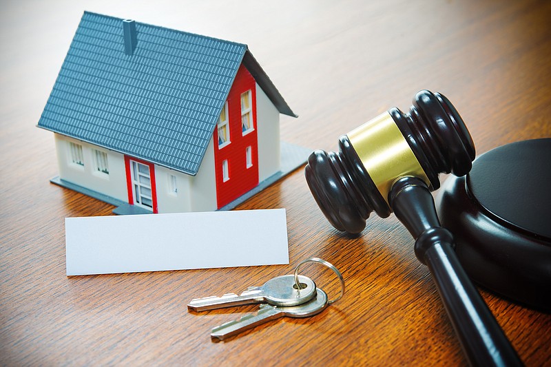 House with a Gavel. Foreclosure, real estate, sale, auction, business, buying - stock photo eviction tile home house tile / Getty Images
