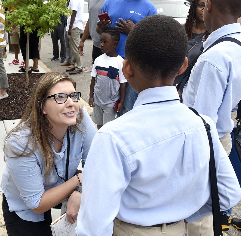 Staff Photo by Robin Rudd / Times Free Press education reporter, Meghan Mangrum, interviews students on the first day of school at Chattanooga Preparatory School.