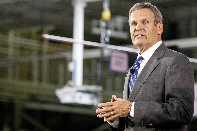 Staff file photo by C.B. Schmelter / Gov. Bill Lee speaks at Chattanooga's Volkswagen assembly plant last October. On Sunday, Lee issued an executive order that government bodies must make reasonable efforts to conduct their business meetings online, preferably livestreamed so the public can stay informed and involved.