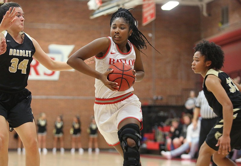 Staff photo / Baylor's Raegyn Conley drives to the basket during the Lady Red Raiders' 2019-20 season opener against visiting Bradley Central on Nov. 21. Baylor lost 60-47 to the Bearettes, who were coming off a Class AAA state title season, but Conley scored a game-high 27 points in her return to the court after a knee injury ended her sophomore season midway through the 2018-19 schedule.