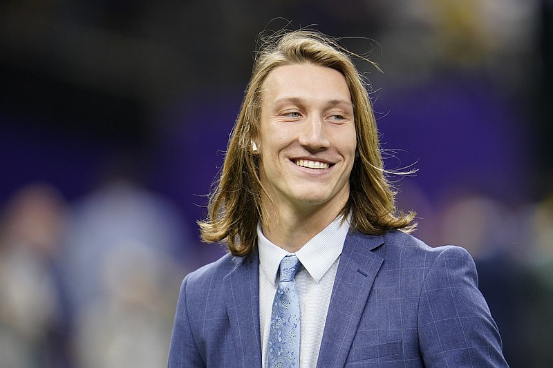 AP photo by David J. Phillip / Clemson University quarterback Trevor Lawrence, pictured, and his girlfriend Marissa Mowry, a soccer player at nearby Anderson University in South Carolina, started a GoFundMe page to raise money for people affected by the new coronavirus. Clemson officials took the page down because it was an NCAA violation, but the NCAA soon after gave the OK for the fundraising to resume.