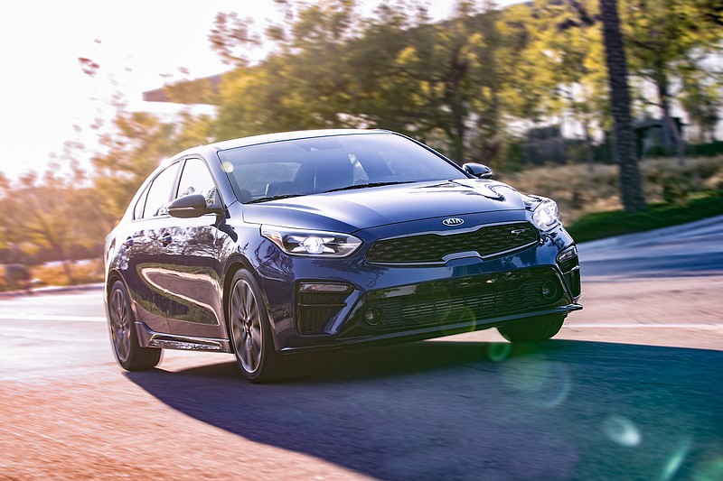 This undated photo from Kia shows the Forte GT, a small sedan that features auto-leveling headlights and automatic high beams. (Courtesy of Kia Motors America via AP)
