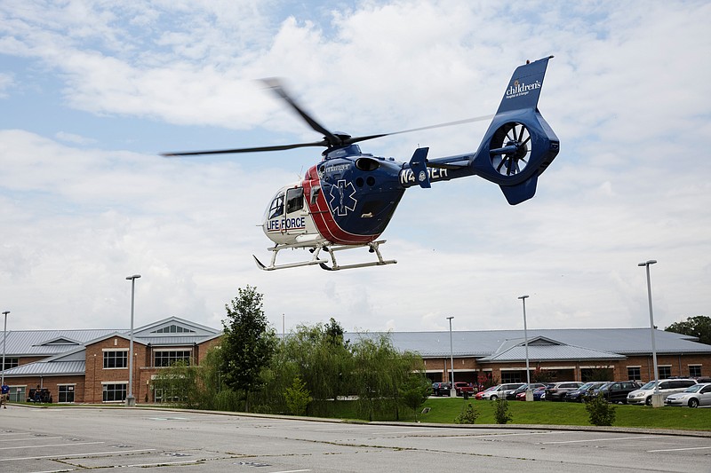 Staff File Photo / A Lifeforce helicopter from Erlanger Health System arrives at Signal Mountain Middle High for a backboard-immobilization workshop in 2018.