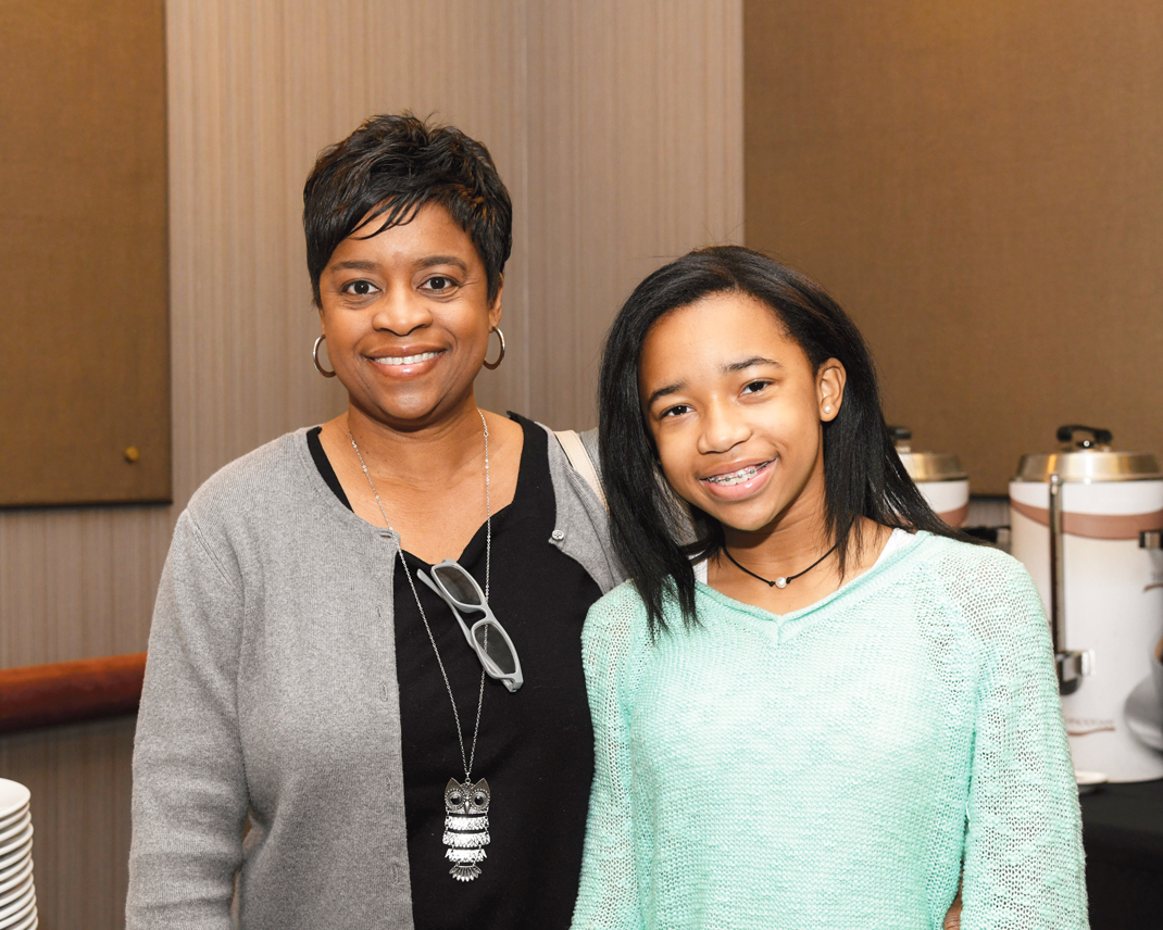 Photography by Mark Gilliland / Darlene & Karrington Paynes attend Habitat for Humanity of Greater Chattanooga's fifth annual Women Build Breakfast.