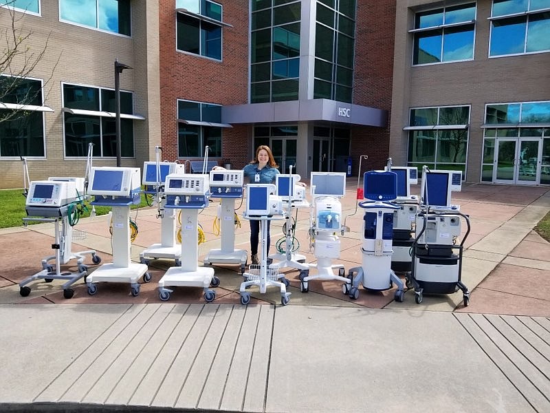 Chattanooga State Community College's Respiratory Care Program Director Katie Davidson poses with respiratory equipment, including eight ventilators, being loaned to Erlanger Health Systems during the COVID-19 pandemic in March 2020. Photo courtesy of Chattanooga State Community College. Contributed Photo/Times Free Press