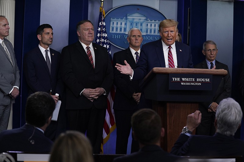 Photo by Evan Vucci of The Associated Press / President Donald Trump responds to a question by NBC News White House correspondent Peter Alexander during a coronavirus task force briefing at the White House on Friday, March 20, 2020, in Washington.