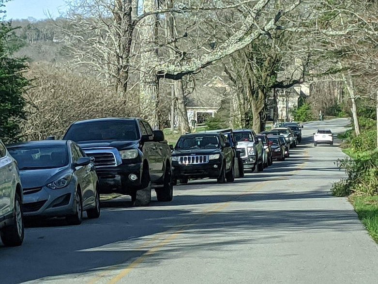 Photo by the Signal Mountain Police Department / Cars line Ohio Avenue near the Rainbow Lake trailhead in Signal Mountain. The town banned parking on the road starting March 27, and closed the Rainbow Lake trail starting at noon March 29. Officers are posted at both the Signal Point and Ohio Avenue trailheads to enforce the closure.