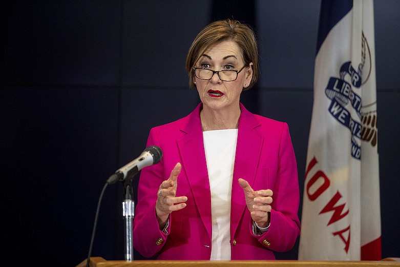 Iowa Governor Kim Reynolds speaks to the press during a news conference on Sunday, March 29, 2020, about the coronavirus COVID-19 and the state's response from the State Emergency Operation Center in Johnston, Iowa. (Kelsey Kremer/The Des Moines Register via AP, Pool)