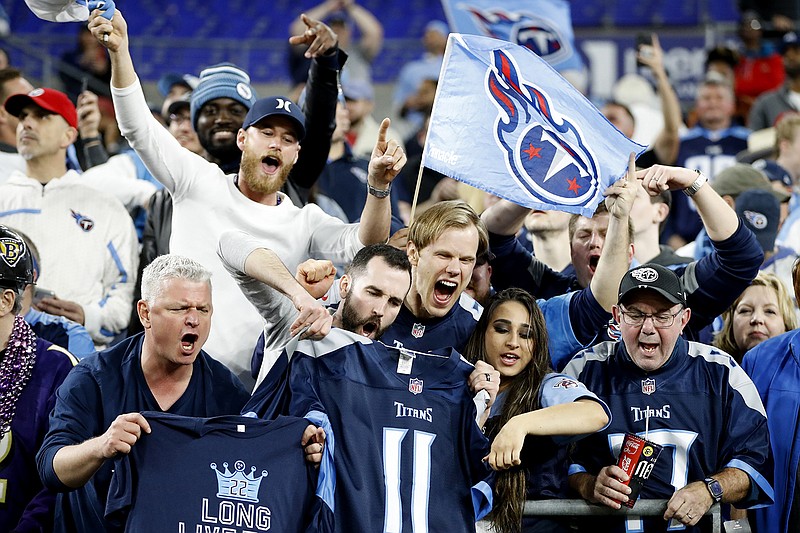 AP photo by Julio Cortez / Tennessee Titans fans cheer after their wild-card team won against the AFC No. 1-seeded Baltimore Ravens on Jan. 11 in the divisional round of the playoffs.