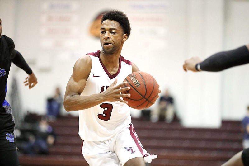 Lee University photo / Beyuan Hendricks, who helped lead Baylor to back-to-back appearances in the TSSAA Division II-AA boys' basketball state tournament as an upperclassman, dealt with several challenges as a freshman at Lee University this past season. The major off-court obstacle was facing concerns about his mother Nakia's health when she was hospitalized for a ruptured brain aneurysm.