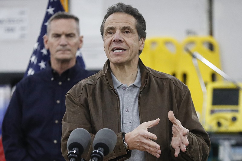 Photo by John Minchillo of The Associated Press / New York Gov. Andrew Cuomo speaks during a news conference at the Jacob Javits Center that will be converted into a temporary hospital on Monday, March 23, 2020, in New York.