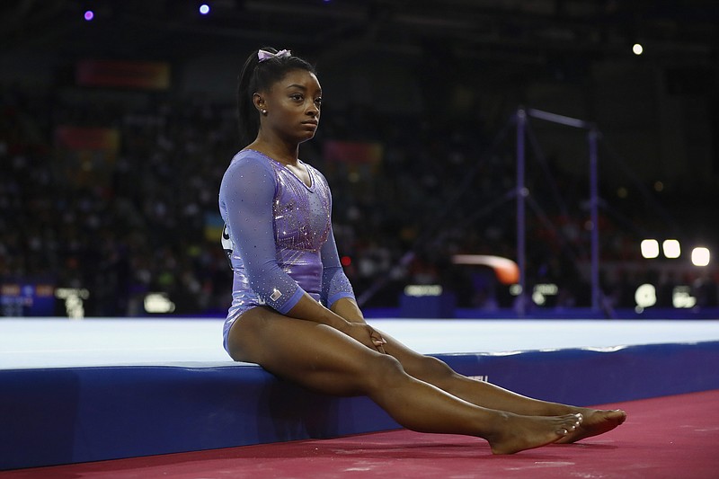 AP photo by Matthias Schrader / U.S. gymnast Simone Biles waits to perform on the floor in the women's apparatus finals at the world championships on Oct. 13, 2019, in Stuttgart, Germany.