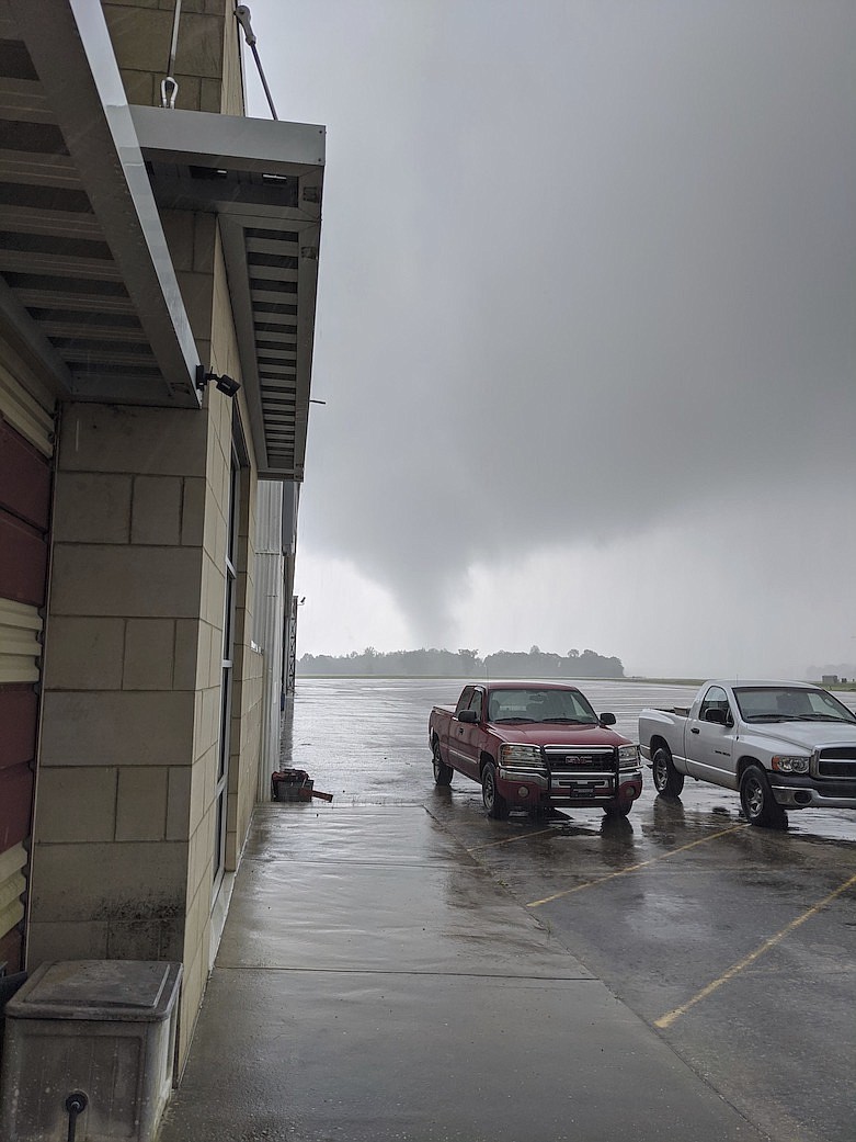 This photo provided by Geoffrey Bateman shows storm clouds at the Troy Municipal Airport on Tuesday, March 31, 2020 in Troy, Ala. Strong storms with high winds and possible tornados toppled trees from Mississippi to Georgia on Tuesday, smashing buildings, blocking roads and causing power outages as utility lines fell.( Geoffrey Bateman via AP)