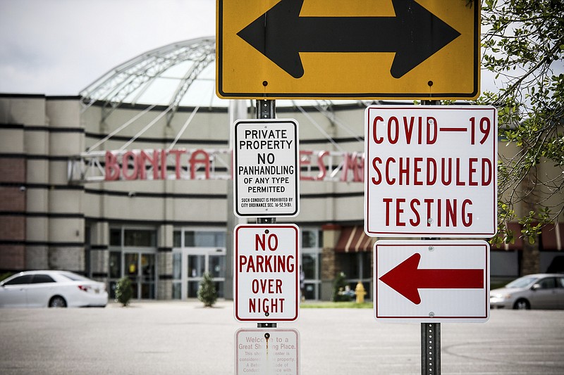 Signs around the Bonita Lakes Mall in Meridian, Miss., direct the public to the testing area for the COVID-19 coronavirus. The testing site will be open from 9 a.m. to 4 p.m. Wednesday, April 1, 2020 at the Sears Auto Center at Bonita Lakes Mall and is open only to Mississippi residents and by appointment. (Paula Merritt/The Meridian Star via AP)


