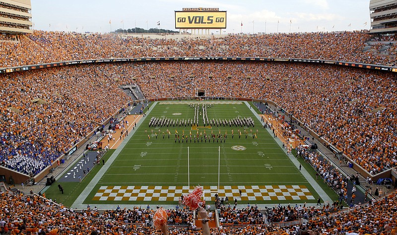 Staff photo by C.B. Schmelter / Tennessee's "Pride of the Southland" marching band forms the giant "T" before the Volunteers take the field inside Neyland Stadium before their 2018 football matchup against SEC East rival Florida.