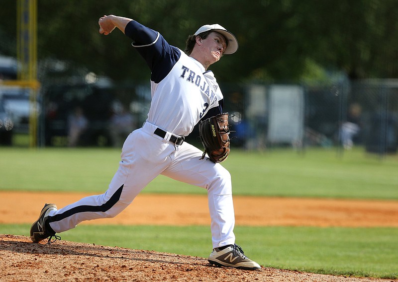 Staff file photo / Gordon Lee's Jake Wright pitches against visiting Seminole County in a GHSA Class A public quarterfinal series on May 8, 2019. The Trojans were going for their third straight baseball state title this year before the GHSA canceled the remainder of its spring sport seasons with schools closed due to the COVID-19 pandemic.