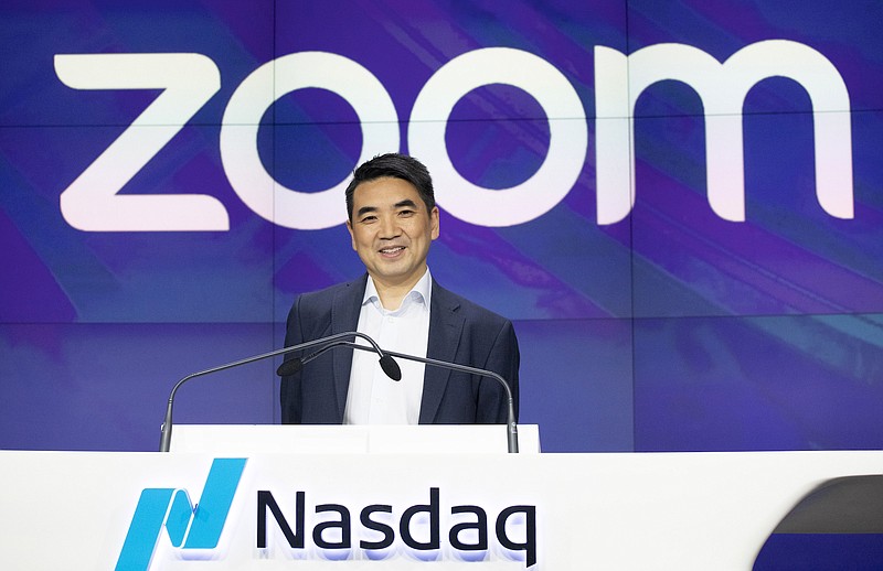 Photo by Mark Lennihan of The Associated Press / Zoom CEO Eric Yuan attends the opening bell at Nasdaq as his company holds its IPO on April 18, 2019, in New York. Millions of people are now working from home as part of the intensifying fight against the coronavirus outbreak. Zoom, the video conference service, is being used by millions.
