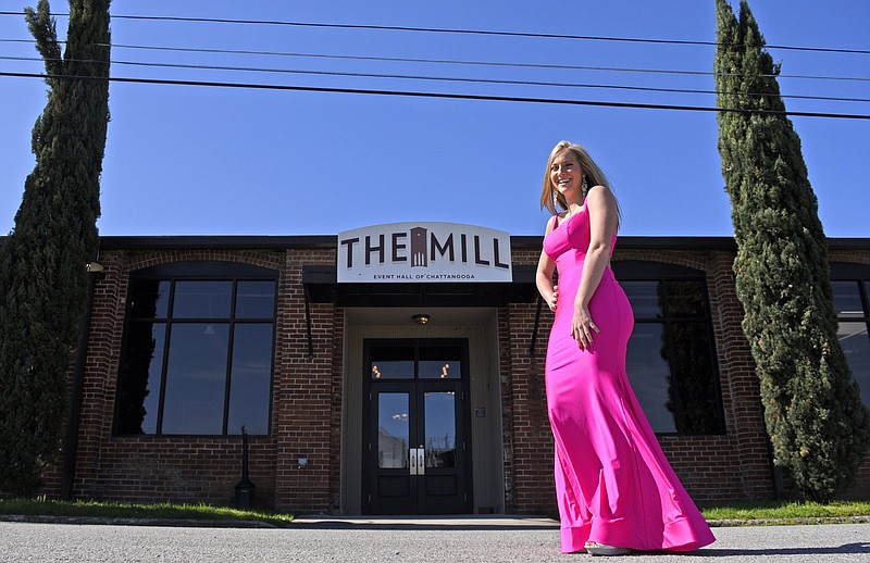 Staff Photo by Robin Rudd / Mollie Bishop is a senior at Hixson High School. She's been preparing for her senior prom since January, but in the wake of the current coronavirus crisis, prom might not be held at all. She posed  in her prom dress outside the Mill, the original venue! on April 2, 2020.