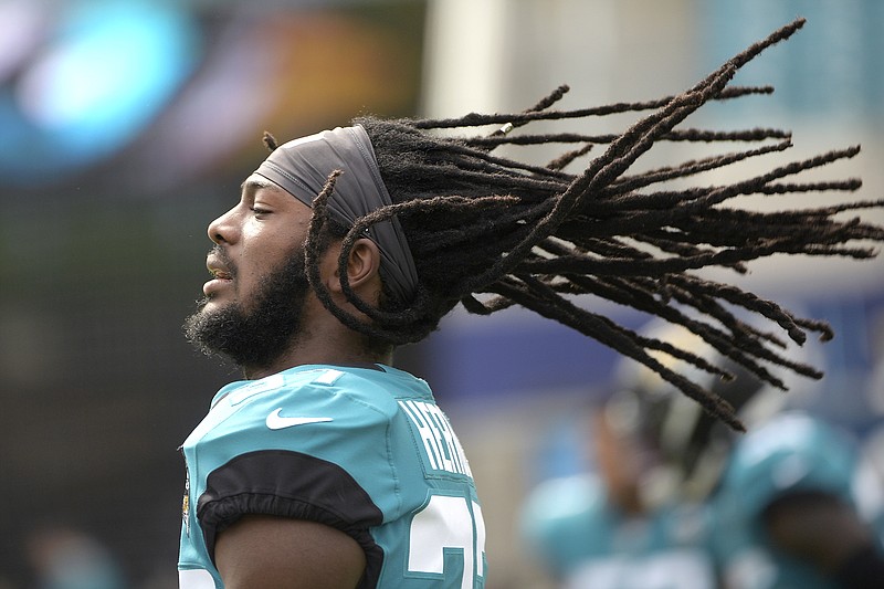 Jacksonville Jaguars cornerback Tre Herndon, who played at East Hamilton and Vanderbilt, warms up for a home game in October 2019. Herndon and his girlfriend recently pledged a donation that will provide thousands of meals for Floridians in need.