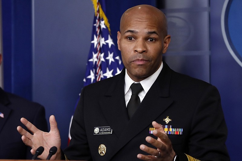 U.S. Surgeon General Jerome Adams speaks about the coronavirus in the James Brady Press Briefing Room of the White House, Friday, April 3, 2020, in Washington. (AP Photo/Alex Brandon)