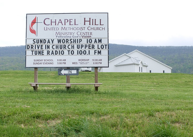 Staff photo by Tim Barber/ Chapel Hill United Methodist Church has drive-in church on the ridgetop parking lot in the Sequatchie Valley. The Bishop broadcast his message via FM radio with more than one-hundred attendees on the lot in Sequatchie County, near Dunlap.
