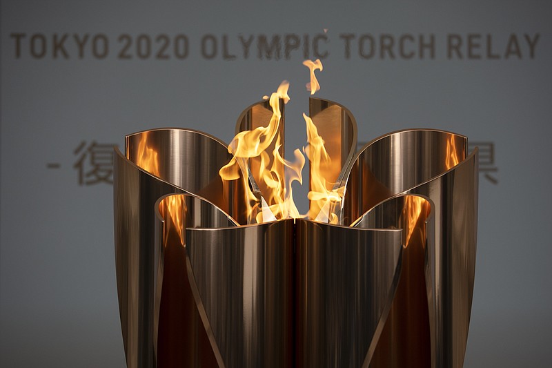 AP photo by Jae C. Hong / The Olympic flame burns during a March 24 ceremony in Fukushima City, Japan. The flame will be on display until the end of April in Japan's northeastern prefecture of Fukushima.