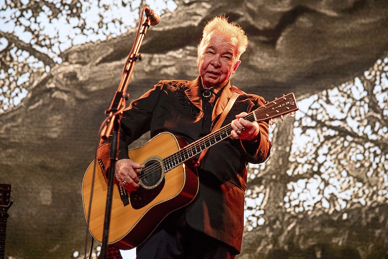 This June 15, 2019, file photo shows John Prine performing at the Bonnaroo Music and Arts Festival in Manchester, Tenn. The family of John Prine says the singer-songwriter is critically ill and has been placed on a ventilator while being treated for COVID-19-type symptoms. A message posted on Prine's Twitter page Sunday, March 29, 2020, said the "Angel from Montgomery" singer has been hospitalized since Thursday and his condition worsened on Saturday. (Photo by Amy Harris/Invision/AP, File)
