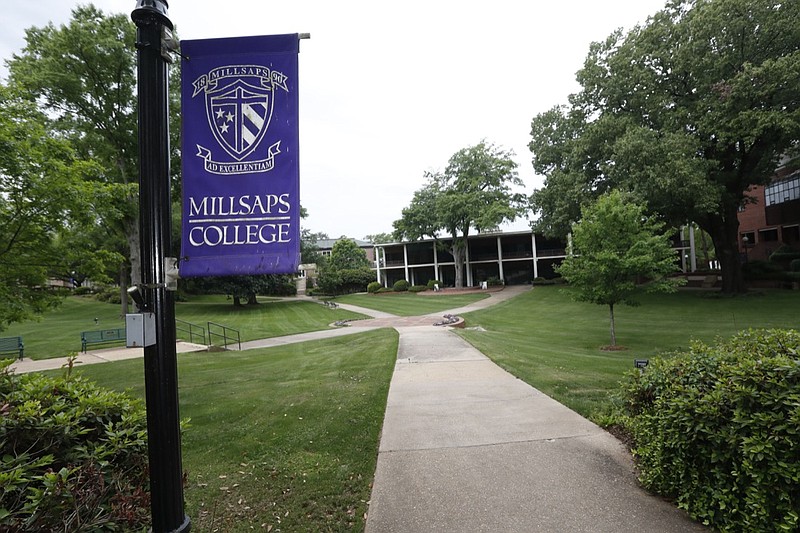 A normally student filled campus square at Millsaps College in Jackson, Miss., is deserted in face of the coronavirus, as the liberal arts school, like many others, faces financial and enrollment challenges Friday, April 3, 2020. At present, the school has switched to on-line teaching. Colleges across the nation are scrambling to close deep budget holes and some have been pushed to the brink of collapse after the coronavirus outbreak triggered a series of financial losses (AP Photo/Rogelio V. Solis)