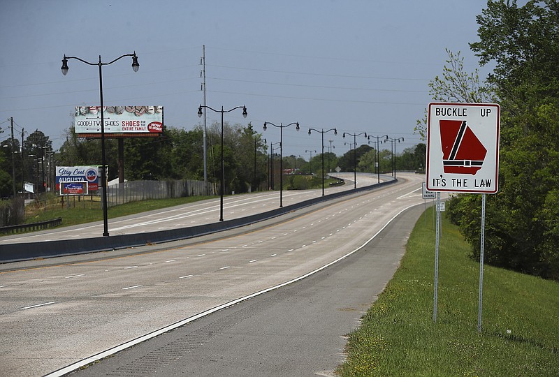 AP photo by Curtis Compton / The John C. Calhoun Expressway that turns into Washington Road at Augusta National Golf Club is quiet Monday on what would have been the first day of practice rounds for the 2020 Masters in Augusta, Ga.