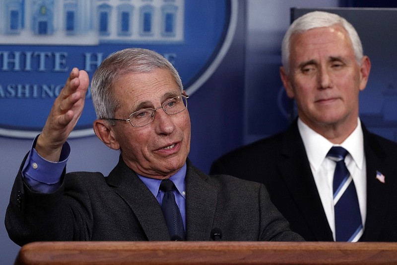 Dr. Anthony Fauci, director of the National Institute of Allergy and Infectious Diseases, speaks about the coronavirus in the James Brady Press Briefing Room of the White House, Tuesday, April 7, 2020, in Washington, as Vice President Mike Pence listens. (AP Photo/Alex Brandon)