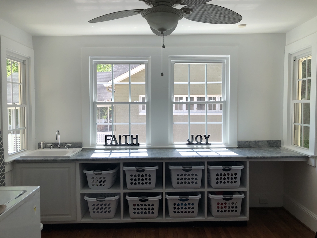 Replacing old windows has been one of the projects keeping Dalton High School football coach Matt Land and his family busy. / Contributed photo by Matt Land