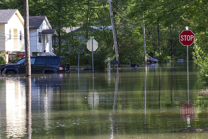Staff photo by Troy Stolt / Flooding is seen off of Swope Drive on Tuesday, April 14, 2020 in East Ridge, Tenn.
