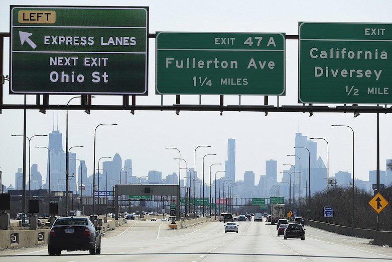 More traffic than usual on I-90 highway south bound in Chicago, Saturday, April 11, 2020. Data may show the number of COVID-19 cases in Illinois is growing at a slower pace than some projections had forecast, but Gov. J.B. Pritzker said his stay-at-home order will remain in place through the end of April.(AP Photo/Nam Y. Huh)