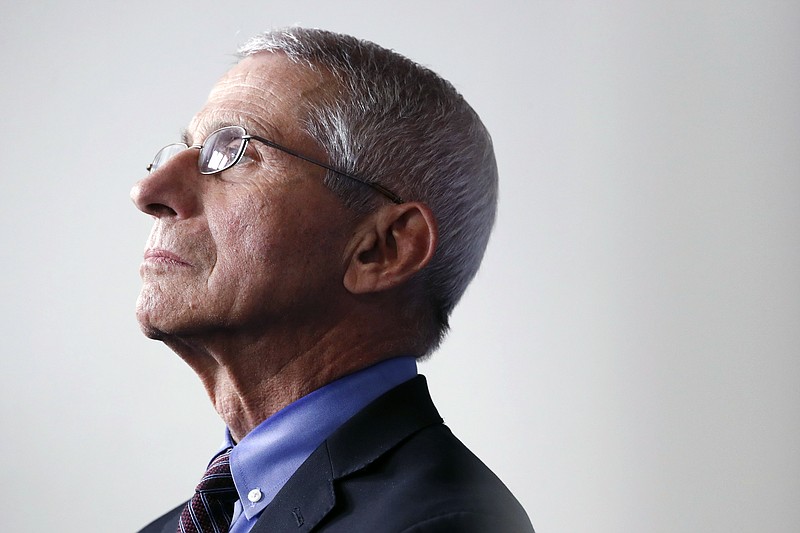 FILE - In this April 9, 2020 file photo, Dr. Anthony Fauci, director of the National Institute of Allergy and Infectious Diseases, listens during a briefing about the coronavirus in the James Brady Press Briefing Room of the White House in Washington. (AP Photo/Andrew Harnik)


