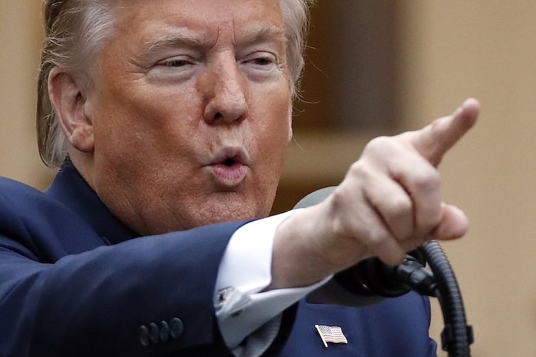 President Donald Trump speaks about the coronavirus in the Rose Garden of the White House, Tuesday, April 14, 2020, in Washington. (AP Photo/Alex Brandon)