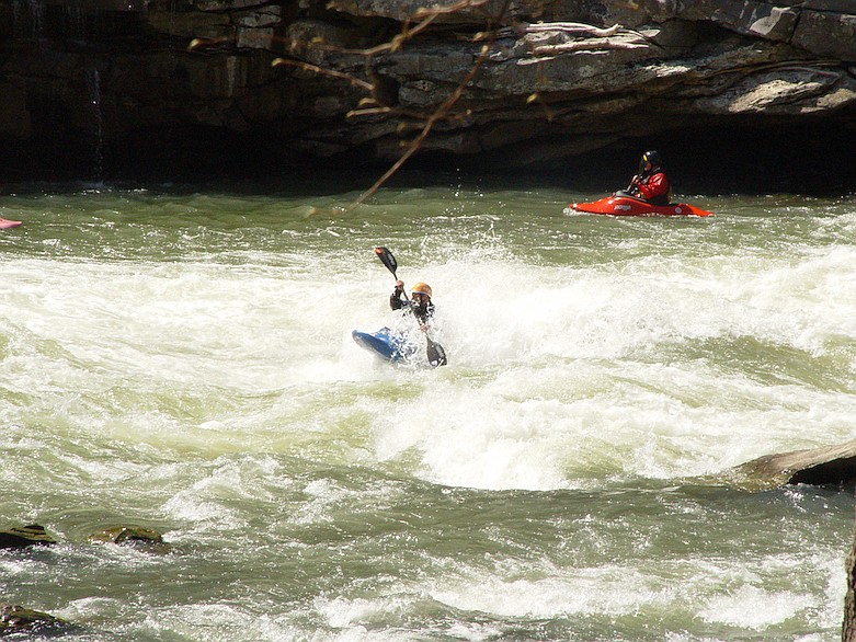 In this 2007 staff file photo, Emily Jackson and brother, Dane, to romp in the froth of Caney Creek Falls. /  Staff file photo