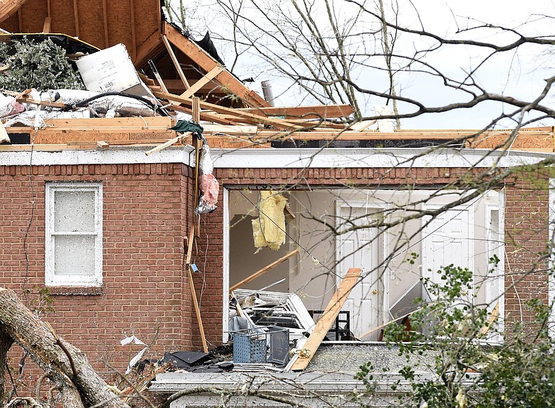 Staff Photo by Robin Rudd / The rear of a heavily damaged house on Galahad Road, East Brainerd, is seen on April 13, 2020. The Chattanooga Area was hit by EF-3 tornado on the night of April 12, 2020.
