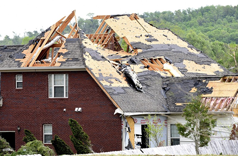 Staff Photo by Robin Rudd / A heavily damaged home on Camelot Lane, in East Brainerd, is seen from Goodwin Road on April 13, 2020. The Chattanooga area was hit by EF-3 tornado on the night of April 12, 2020.
